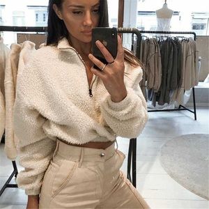 Fluffy white cropped quarter zip